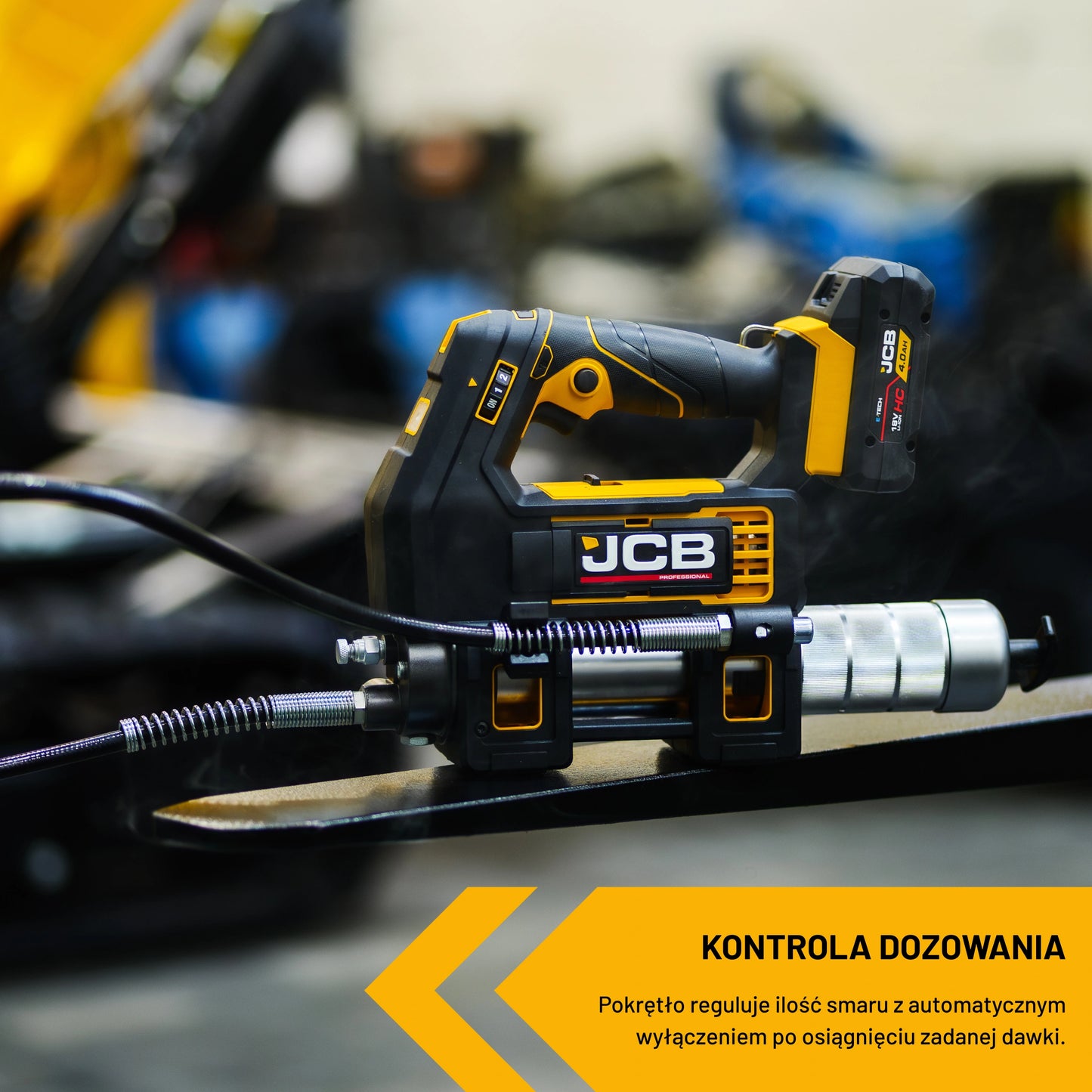 Smarownica akumulatorowa JCB 18PGG-VS na elemencie maszyny kontrola dozowania pokrętło reguluje ilość smaru